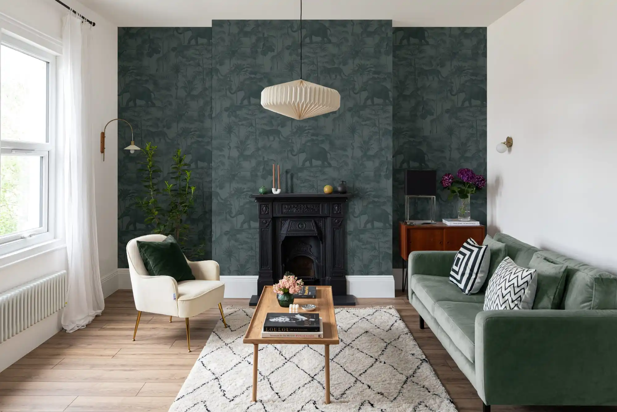Professional wallpaper installer applying a wallcovering